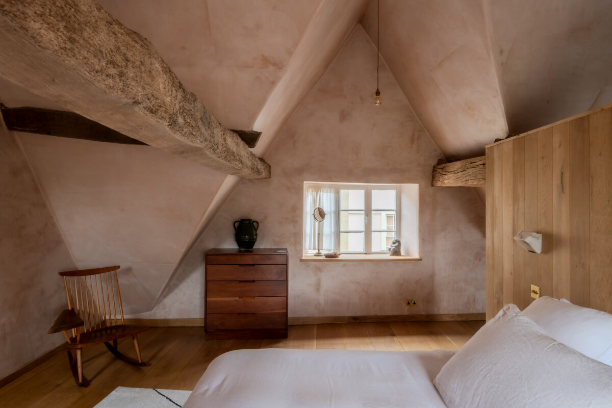 White-Washed Walls and Rustic Elements in a 17th Century Townhouse 22 bedroom pink plaster walls exposed beams
