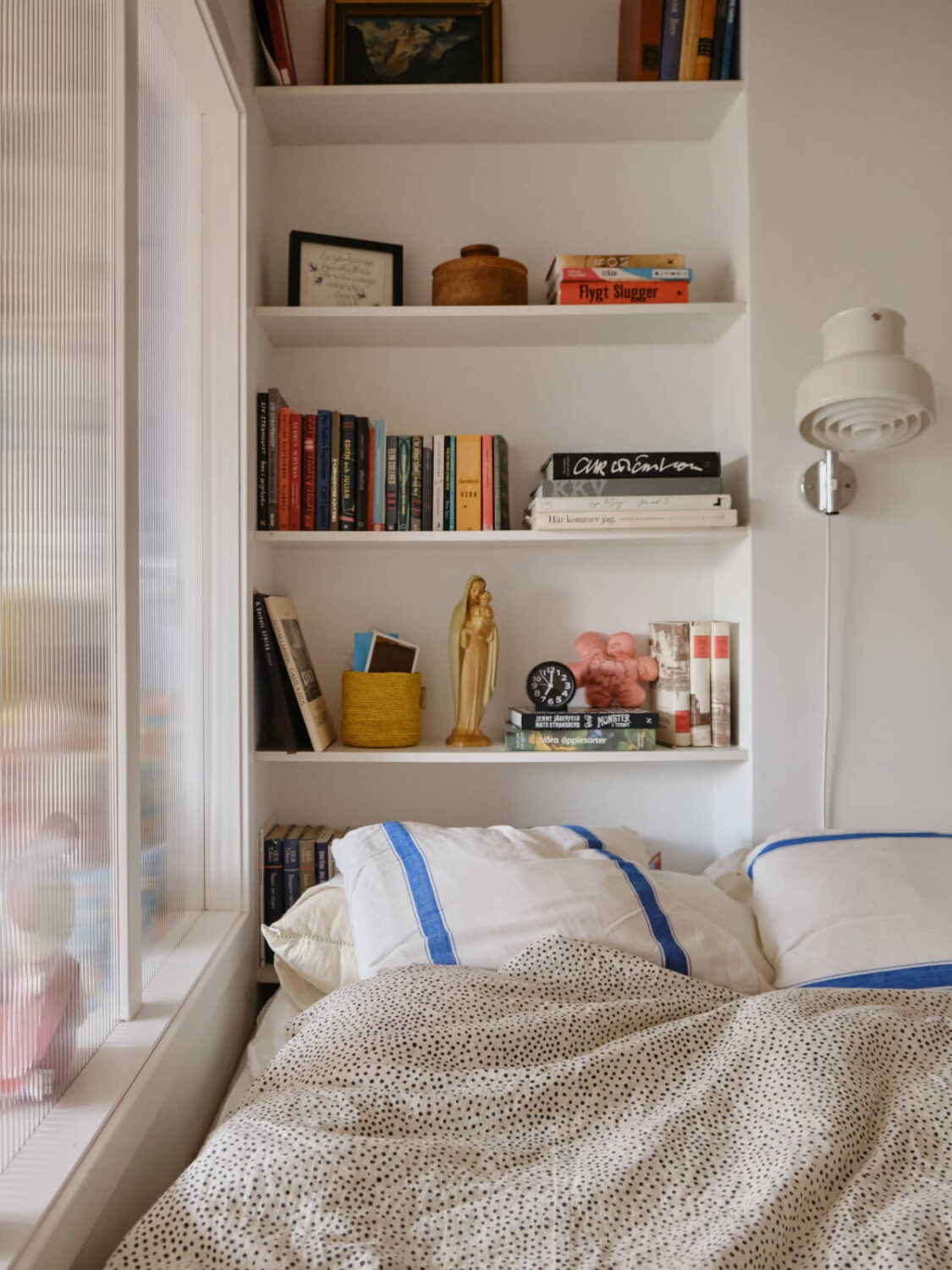 A Colorful 1940s Apartment with Original Elements 28 bedroom shelves