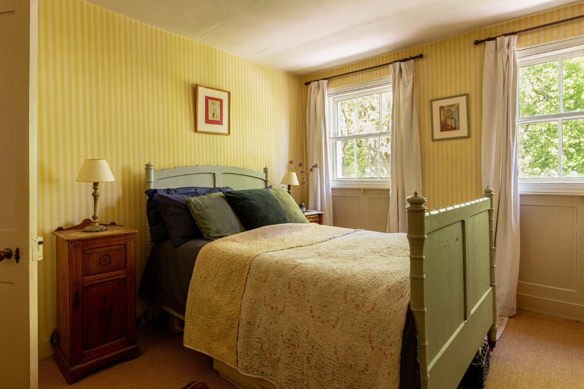 A Carefully Restored Georgian Townhouse in East London 19 bedroom striped yellow wallpaper