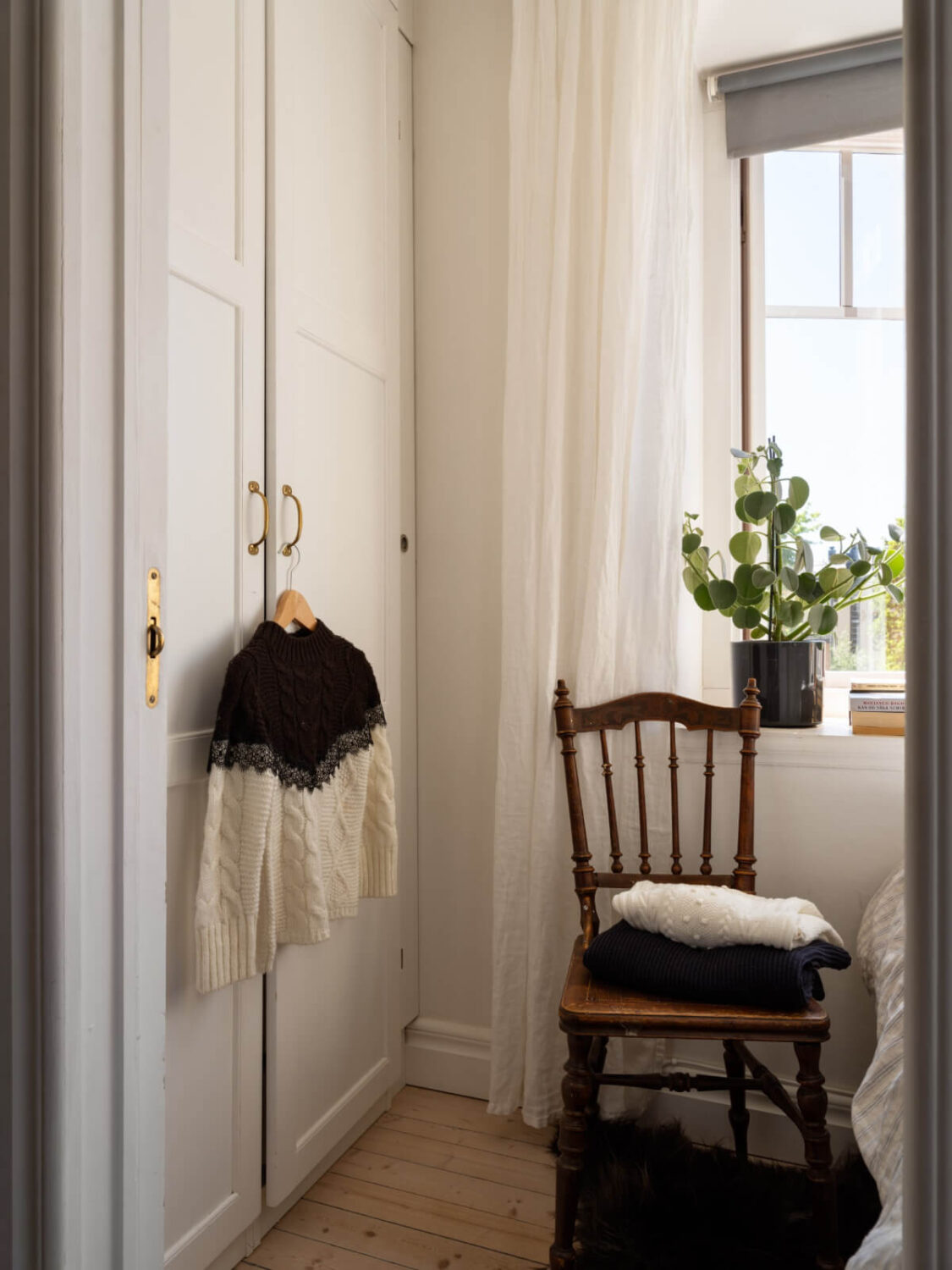 A Small Light-Filled Corner Apartment with Original Details 8 bedroom wardrobes