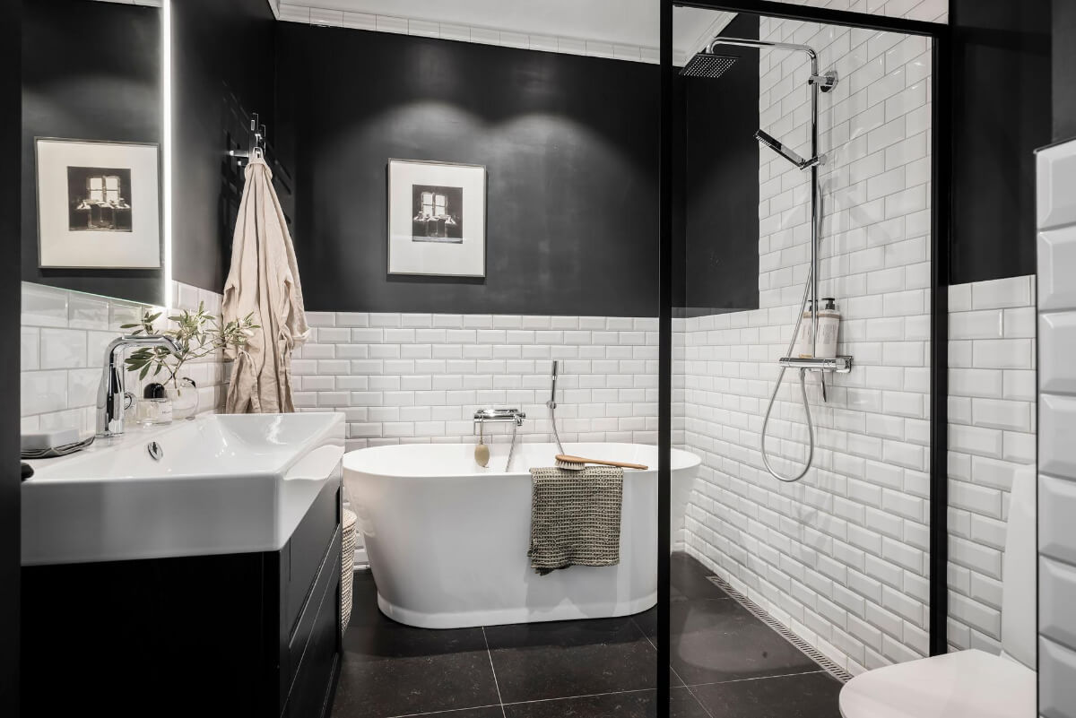 A Teal Green Living Room and Large Windows in a Swedish Apartment 26 black and white bathroom freestanding bath