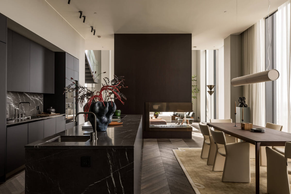 A Luxurious Three-Storey Penthouse in Sweden’s Tallest Residential Tower 7 black marble kitchen dining table
