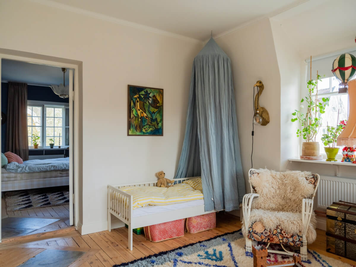 An Early 20th-Century Family Home Decorated with Color and Art 25 blue canopy kids bedroom