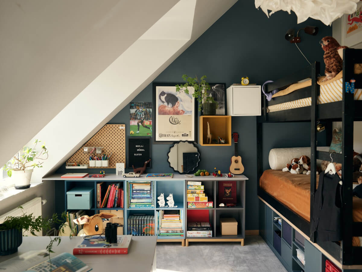 A Stunning Top-Floor Apartment with High Ceilings in a Former Church 24 blue kids bedroom slanted ceiling bunk beds