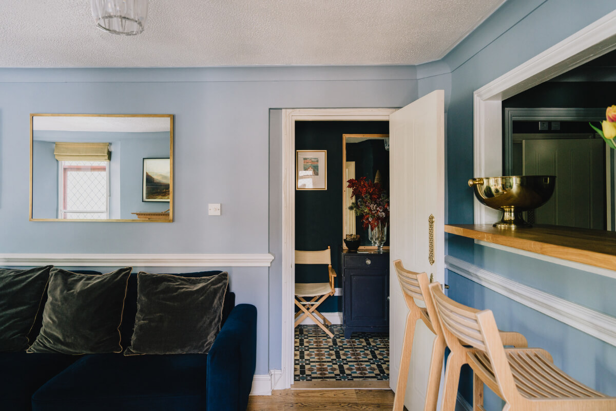 A Colorful Apartment in a Former Victorian Church in London 4 blue living room kitchen bar