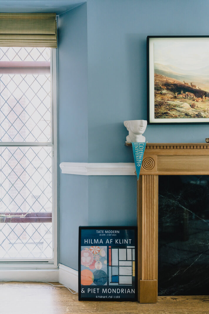 A Colorful Apartment in a Former Victorian Church in London 12 blue walls living room detail