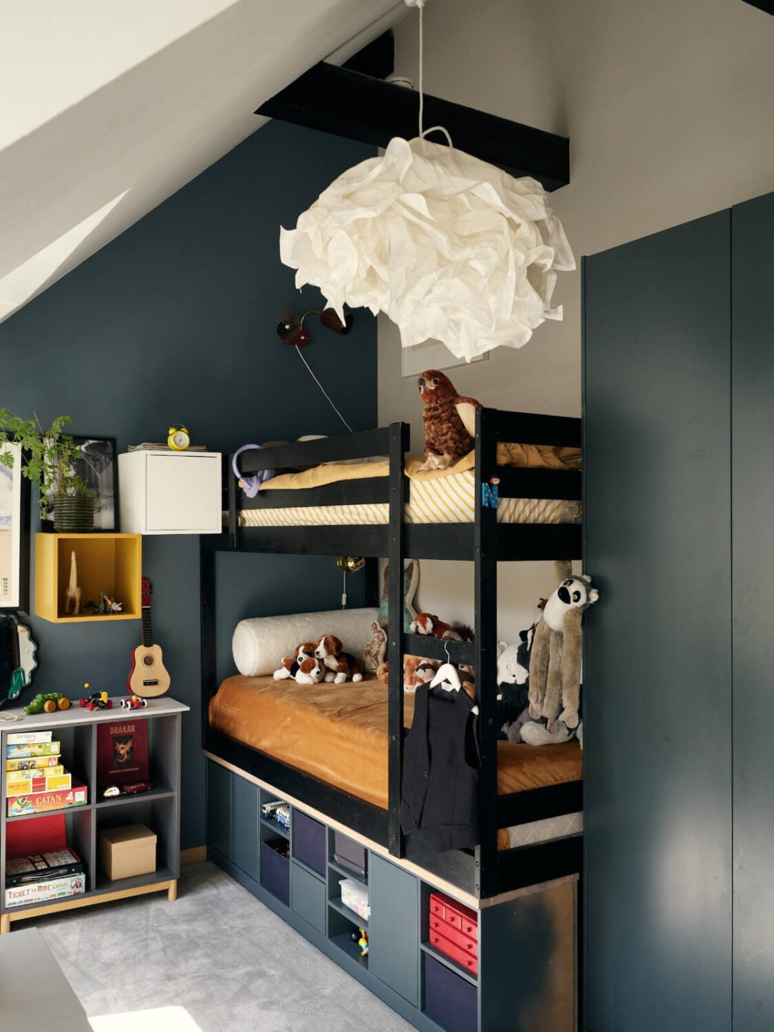 A Stunning Top-Floor Apartment with High Ceilings in a Former Church 25 bunk beds blue kids bedroom
