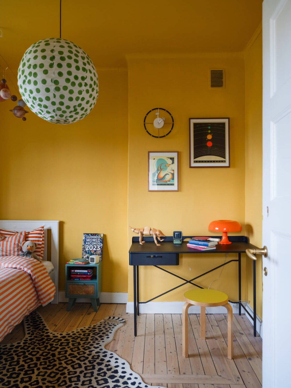 An Early 20th-Century Family Home Decorated with Color and Art 27 childrens room yellow walls desk