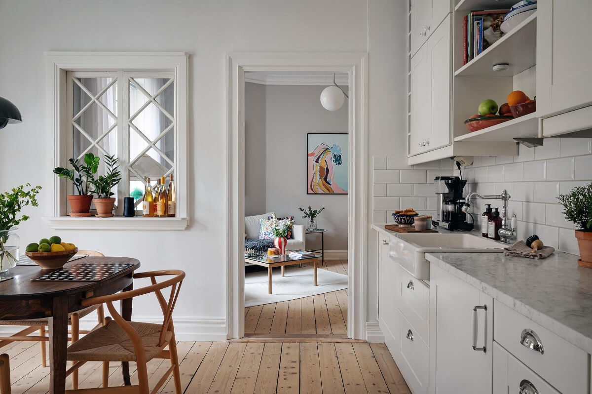 Classic Elements in a Charming Swedish Studio Apartment 11 classic kitchen wooden floorboards