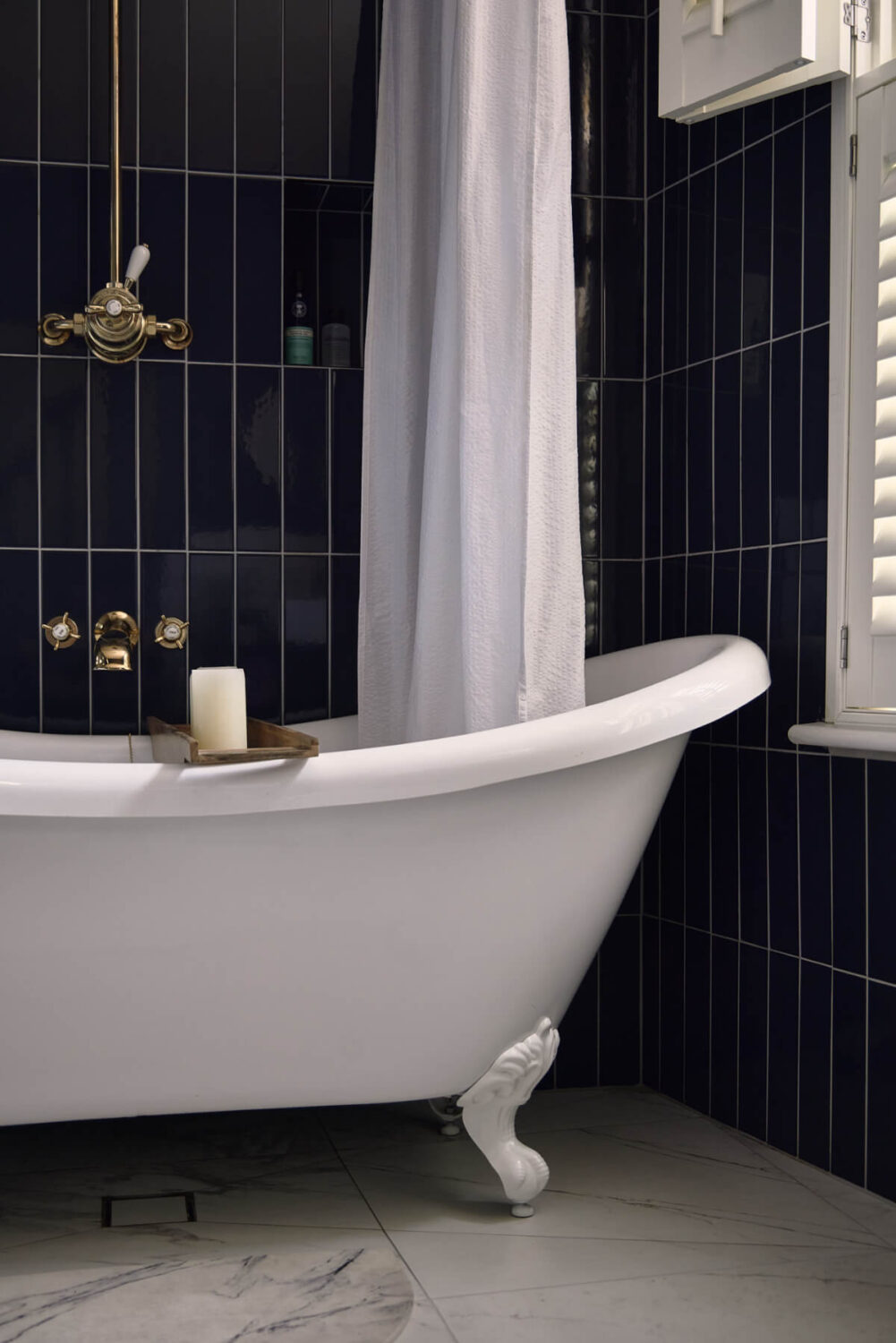 Moody Tones in a Restored and Extended Victorian Home in London 25 clawfoot bath detail