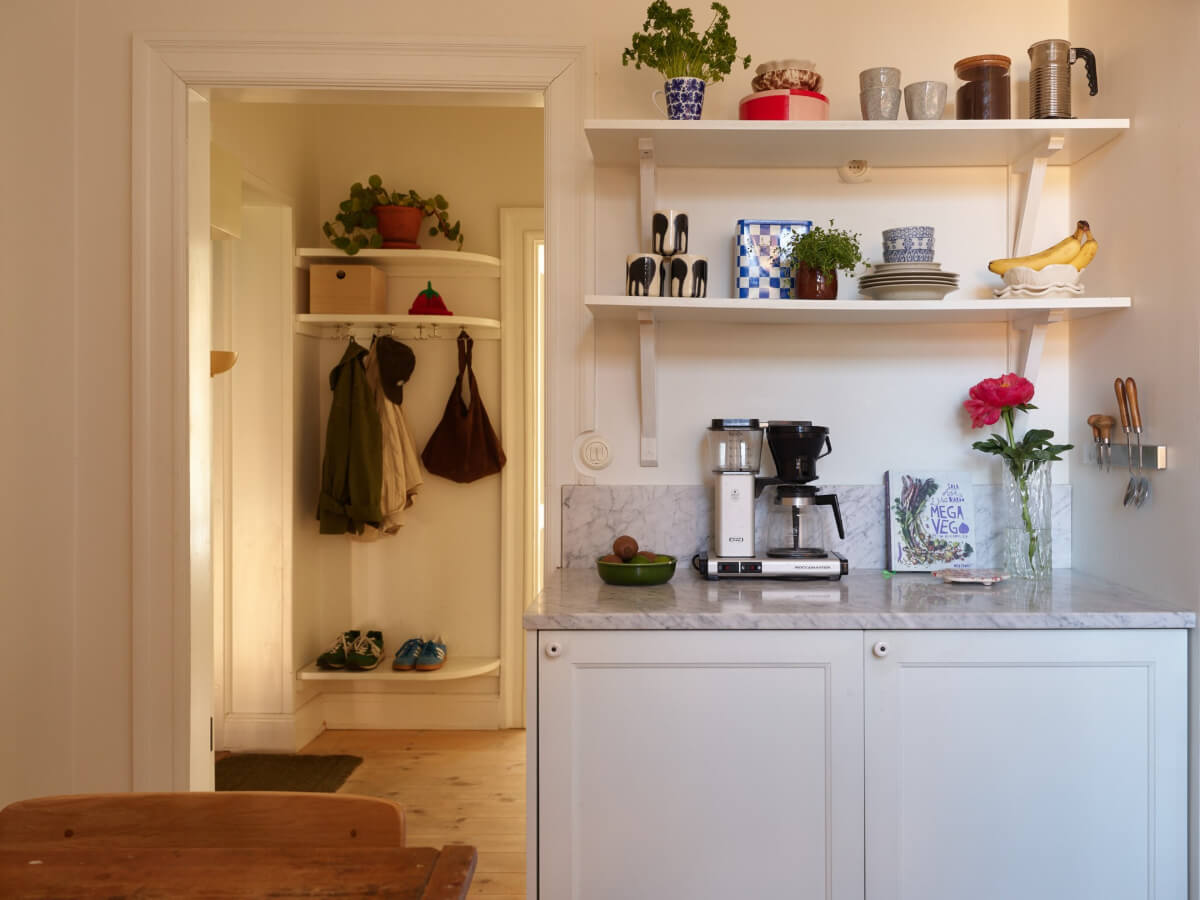 A Light-Filled Stockholm Apartment with Bright Color Pops 20 coffee corner shelves