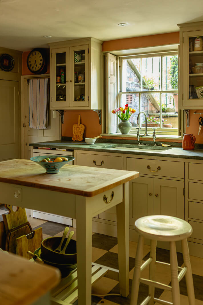 A Carefully Restored Georgian Townhouse in East London 8 cozy kitchen with island and bar seating