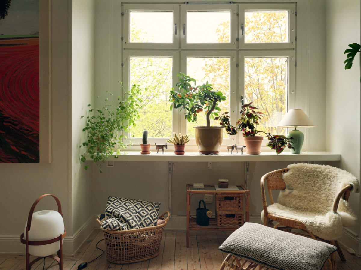 An Art Nouveau Apartment with a Deep Green Kitchen 9 cozy sitting area large window
