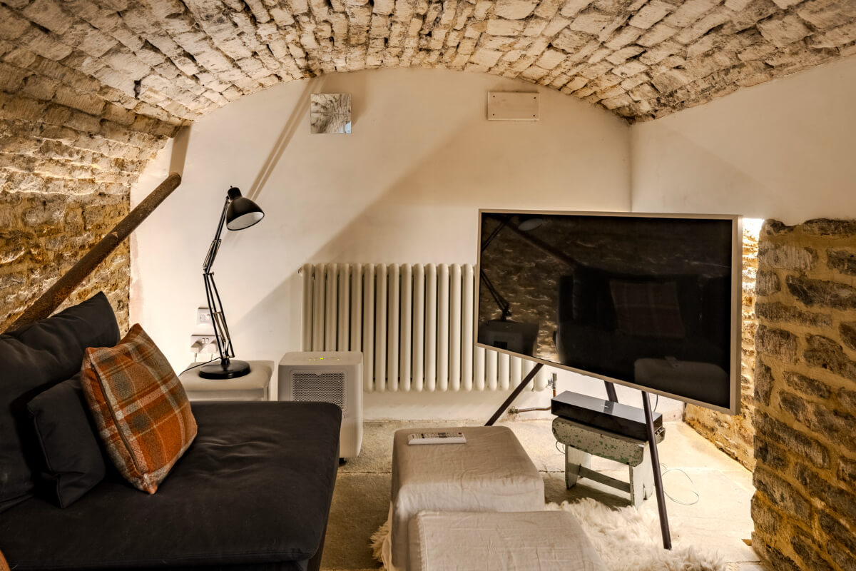 27 Statement Ceiling Ideas That Will Spruce Up Any Room 32 cozy television snug brick ceiling and walls 27 Statement Ceiling Ideas That Will Spruce Up Any Room