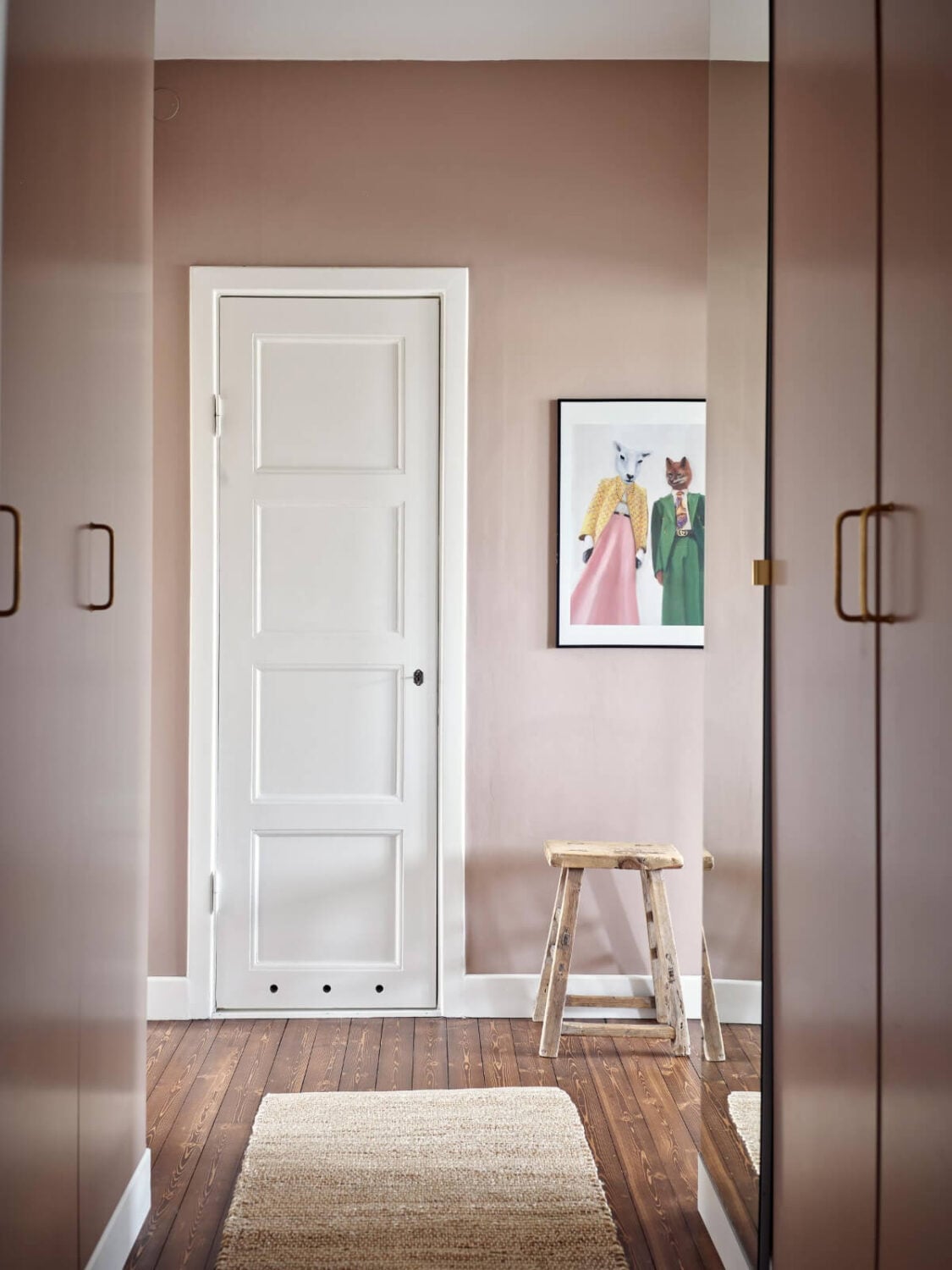 A Harmonious Color Palette in a Swedish Duplex Apartment 30 dark pink hall wardrobes
