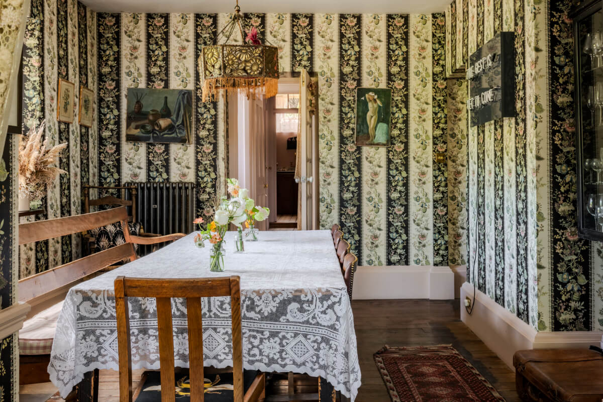 Pearl Lowe and Danny Goffey’s Eclectic Gothic Somerset Home Is For Sale 9 dining room floral wallpaper pearl lowe somerset house nordroom