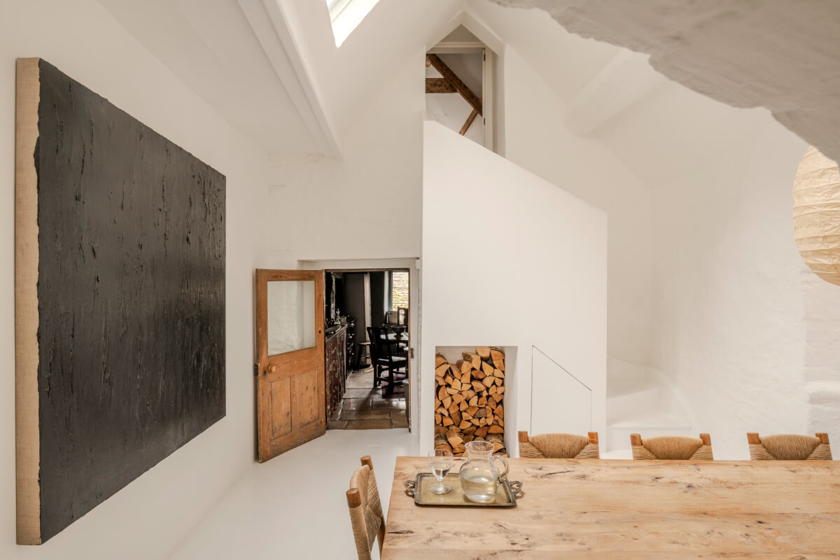 White-Washed Walls and Rustic Elements in a 17th Century Townhouse 7 dining room high pitched white ceiling