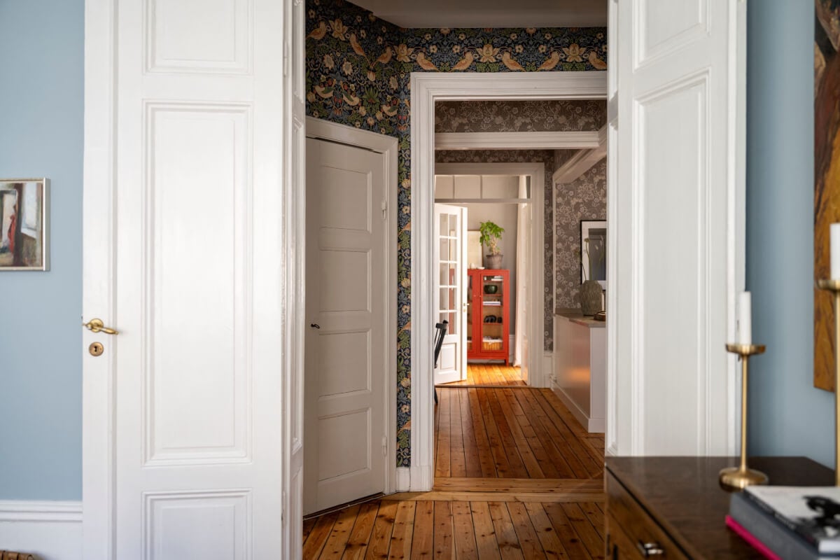 Wallpapers and Blue Tones in a Cozy Turn-of-the-Century Home 7 double doors to hall