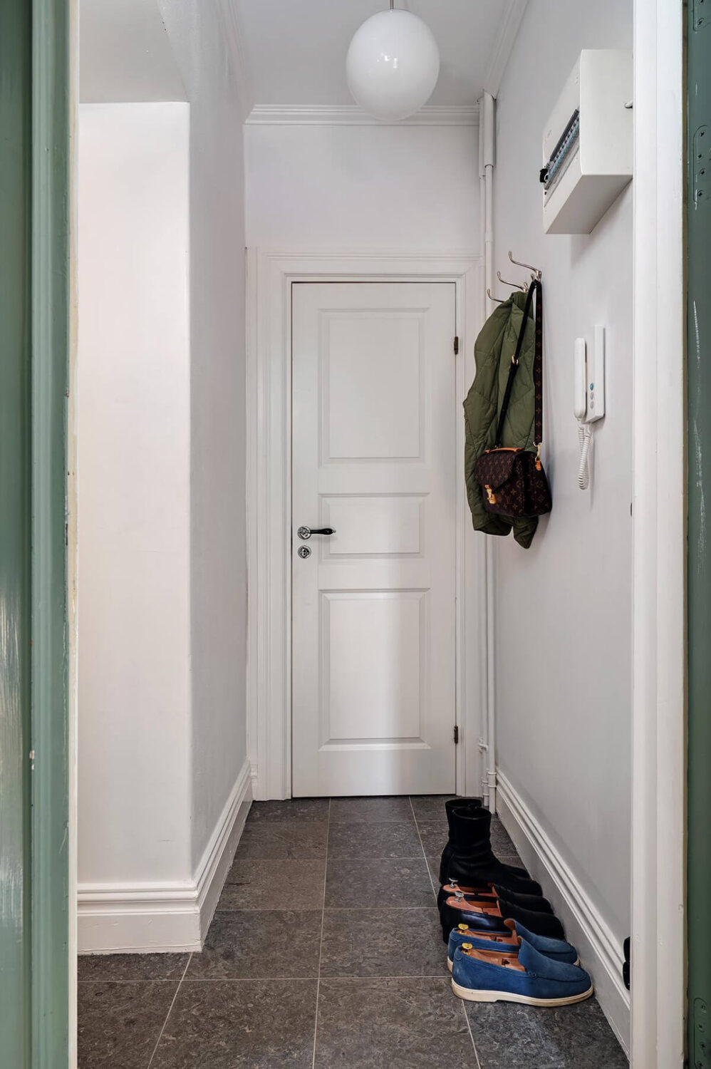 Classic Elements in a Charming Swedish Studio Apartment 25 entry hall tile floor Classic Elements in a Charming Swedish Studio Apartment