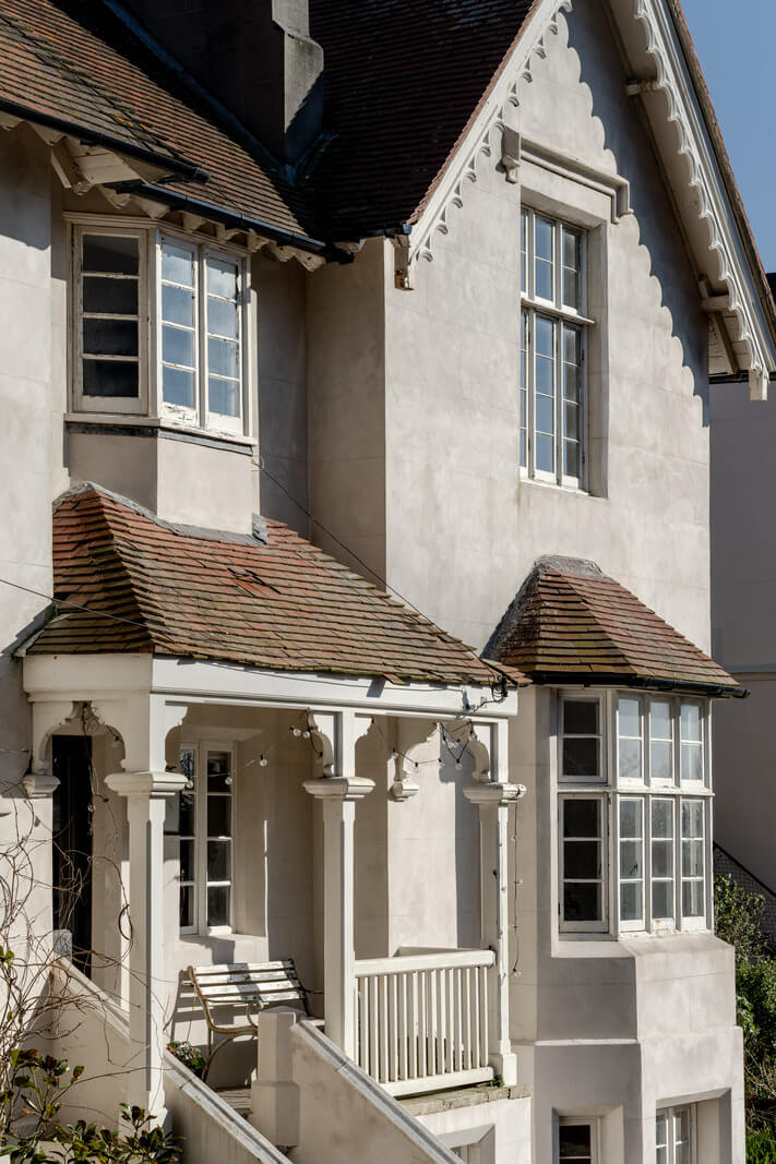Grand, Light-Filled Spaces in a Gothic-Style English Coastal Home 35 facade english home with porch Grand, Light-Filled Spaces in a Gothic-Style English Coastal Home
