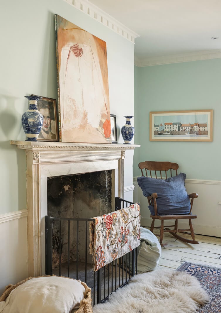 A Family Home with a Cheerful Color Palette in a Historic House 15 fireplace light blue walls