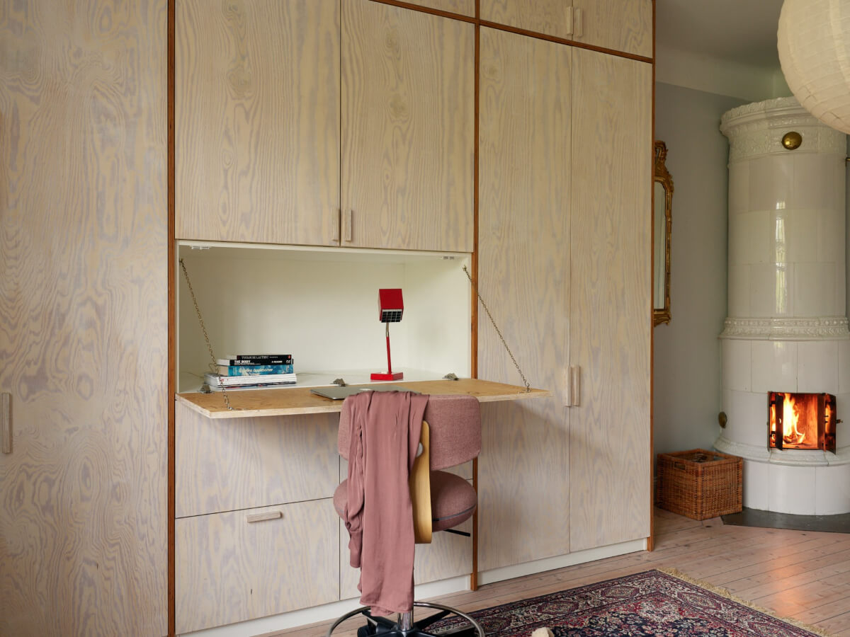 An Art Nouveau Apartment with a Deep Green Kitchen 16 folding desk in wardrobe wall