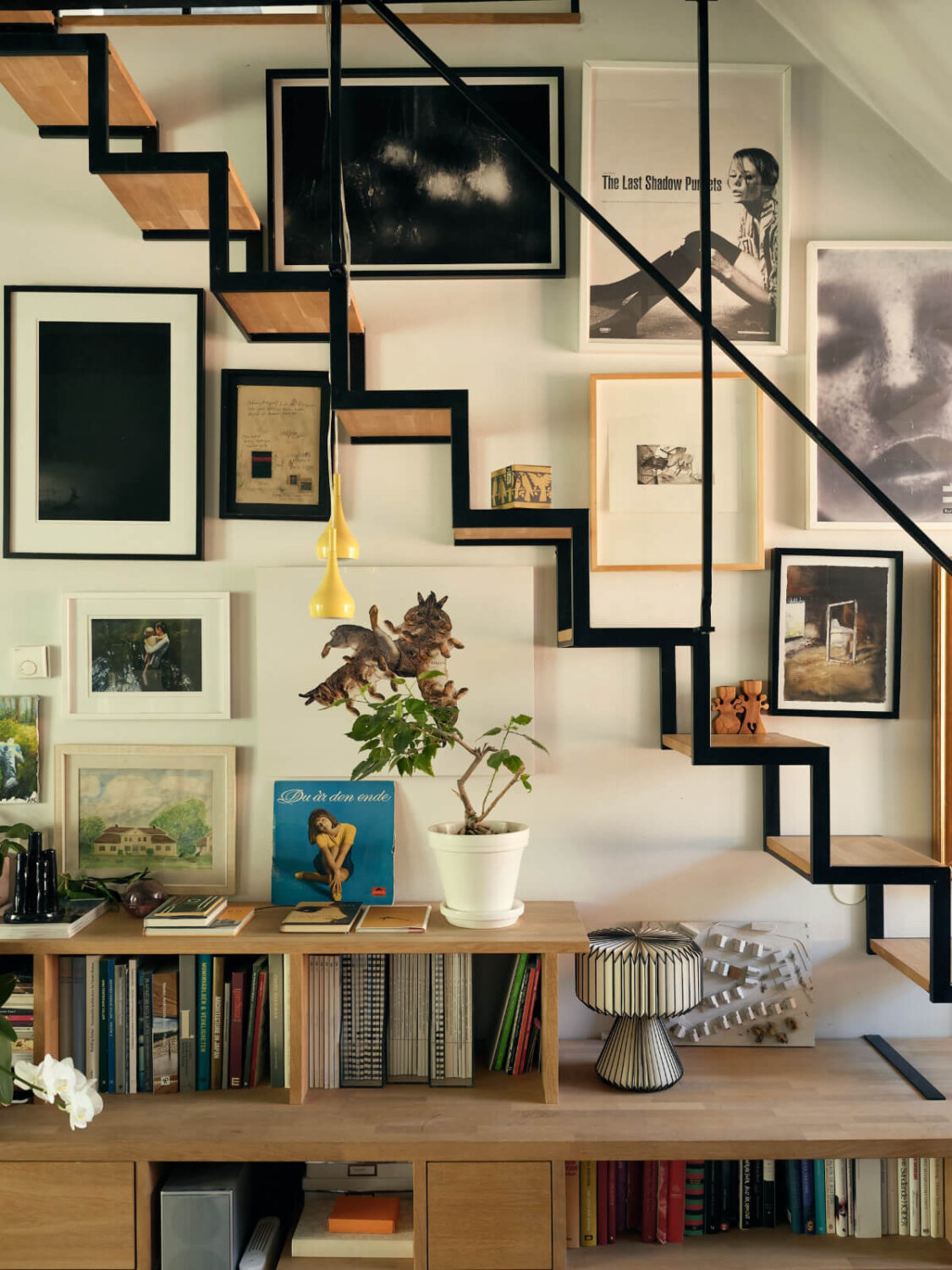 A Stunning Top-Floor Apartment with High Ceilings in a Former Church 2 gallery wall staircase