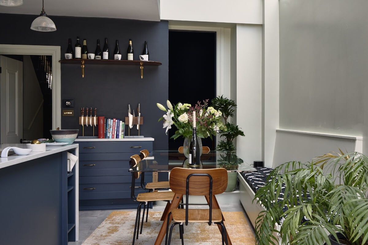 Moody Tones in a Restored and Extended Victorian Home in London 6 glass dining table with bench