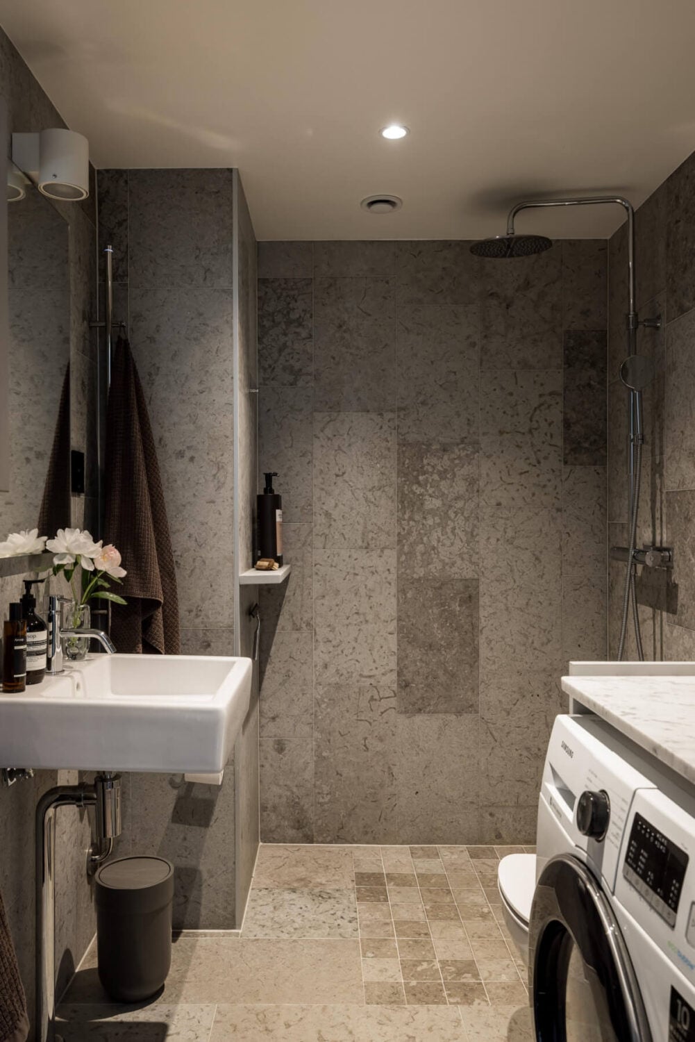 A Small, Cozy Attic Apartment with a Large Terrace 14 gray bathroom