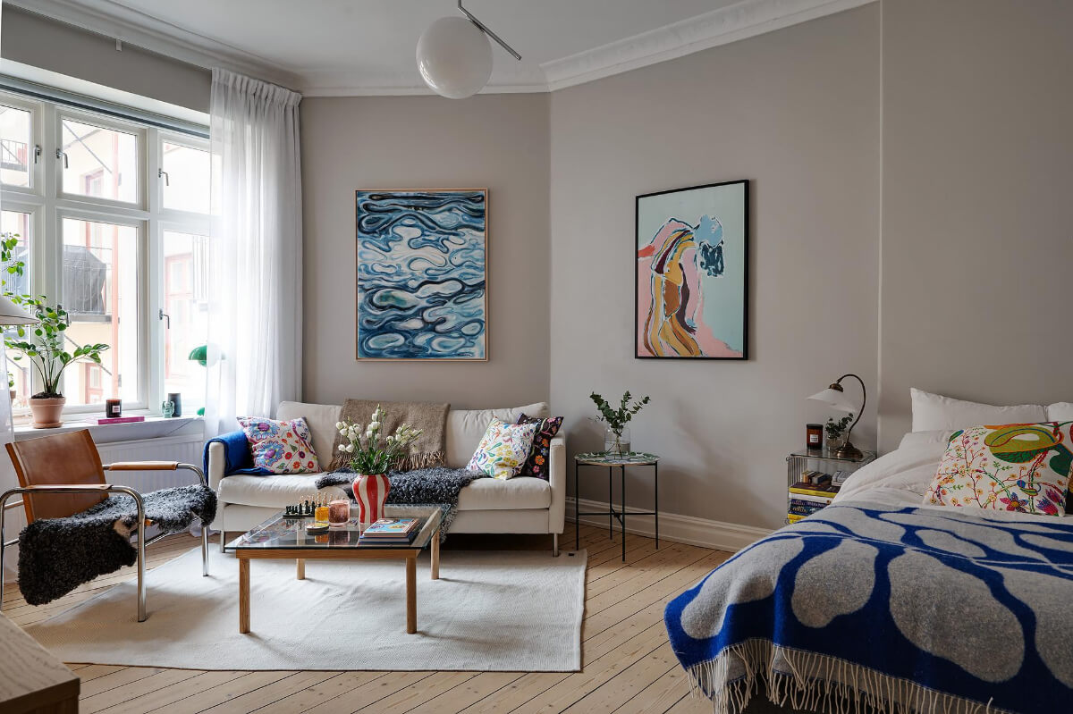 Classic Elements in a Charming Swedish Studio Apartment 2 gray studio apartment wooden floorboards
