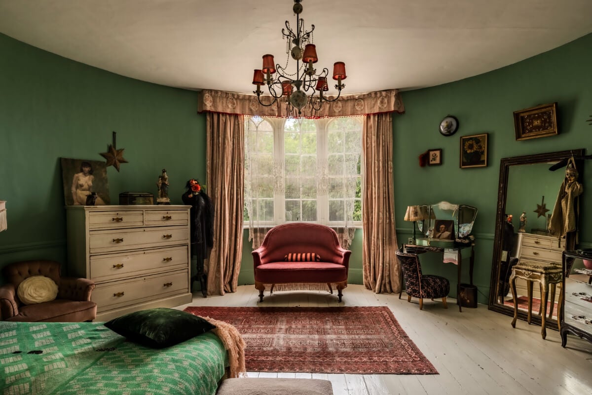 Pearl Lowe and Danny Goffey’s Eclectic Gothic Somerset Home Is For Sale 12 green bedroom rounded wall antique vanity table