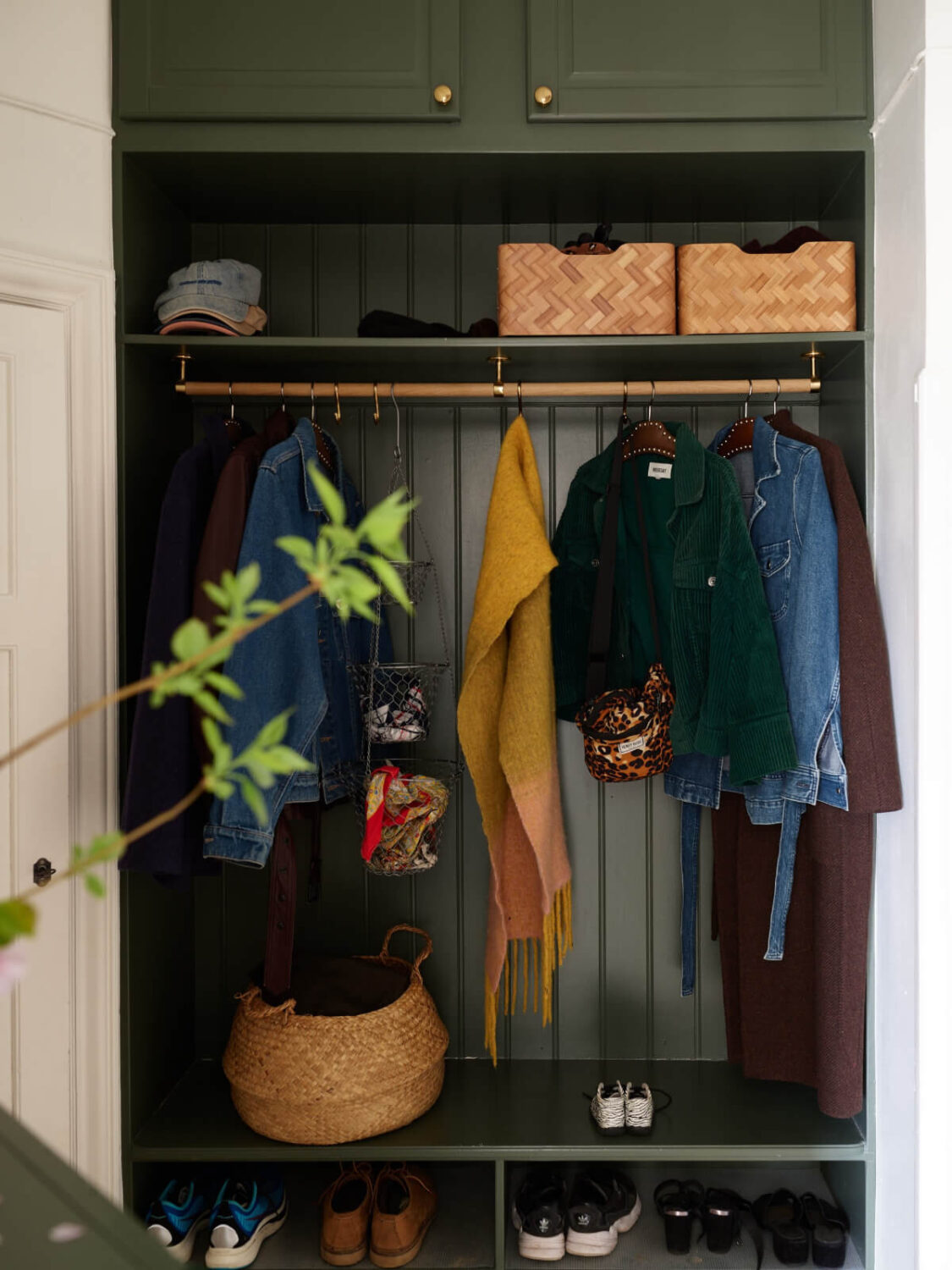 A Beautifully Renovated Early 20th-Century Apartment 26 green built-in hall storage
