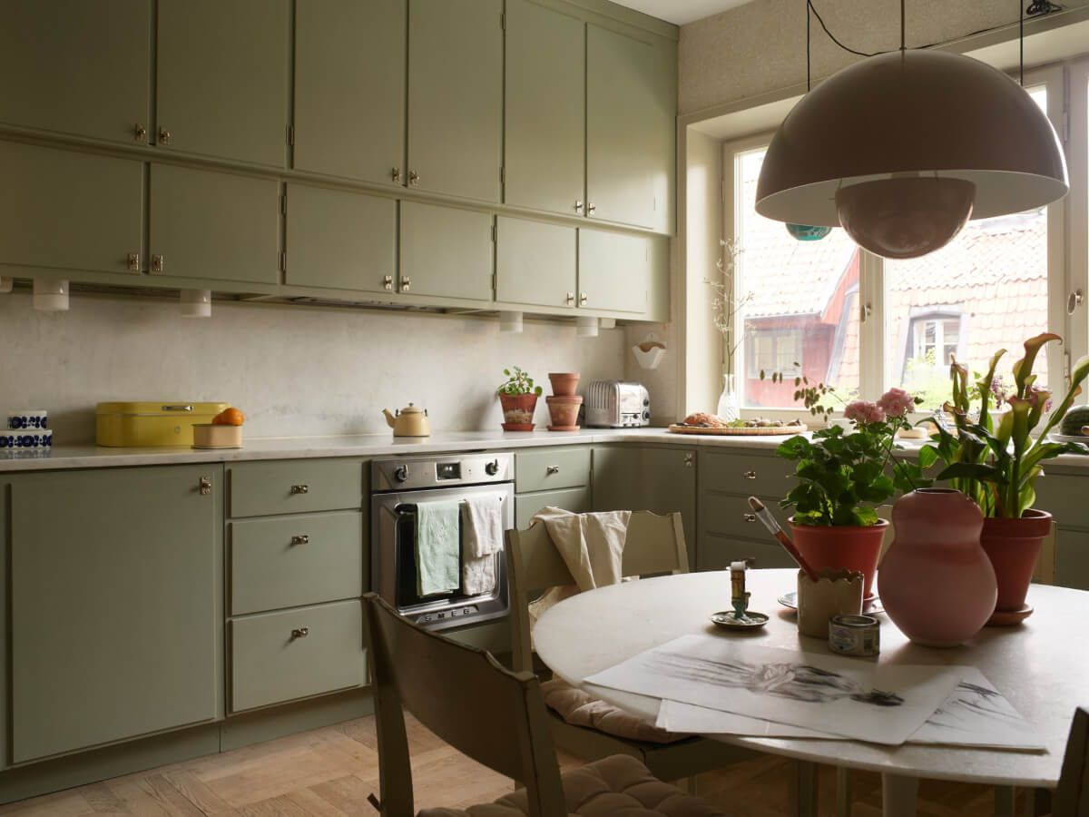 Wallpapers and a Midcentury-Style Kitchen in a 1930s Apartment 13 green midcentury-style kitchen double row upper cabinets