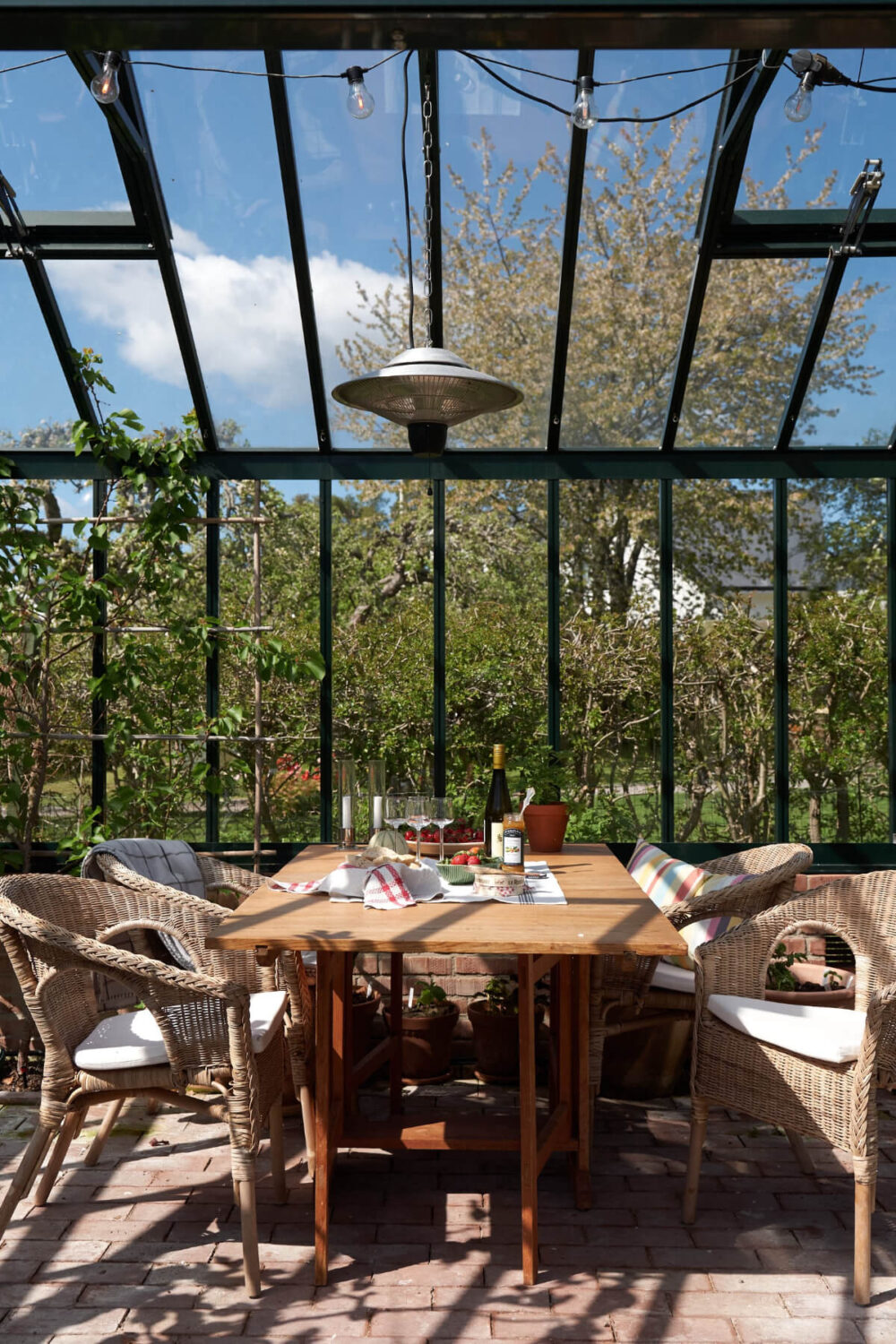 Light-Filled Rooms and Wallpapers in a Swedish Country House 29 greenhouse large table