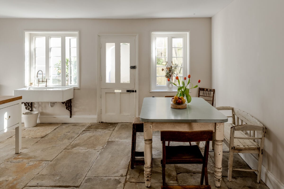 Grand, Light-Filled Spaces in a Gothic-Style English Coastal Home 23 guest house kitchen flagstone floor