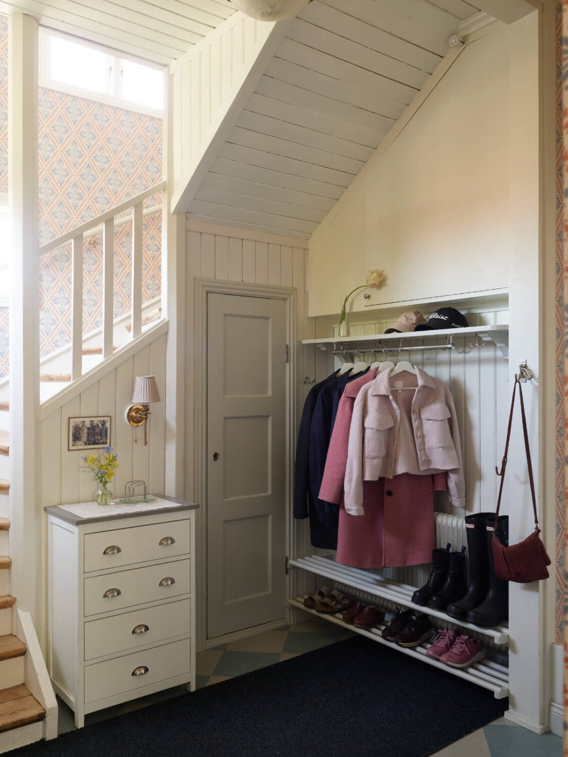 Light-Filled Rooms and Wallpapers in a Swedish Country House 14 hall blue and white checkerboard floor