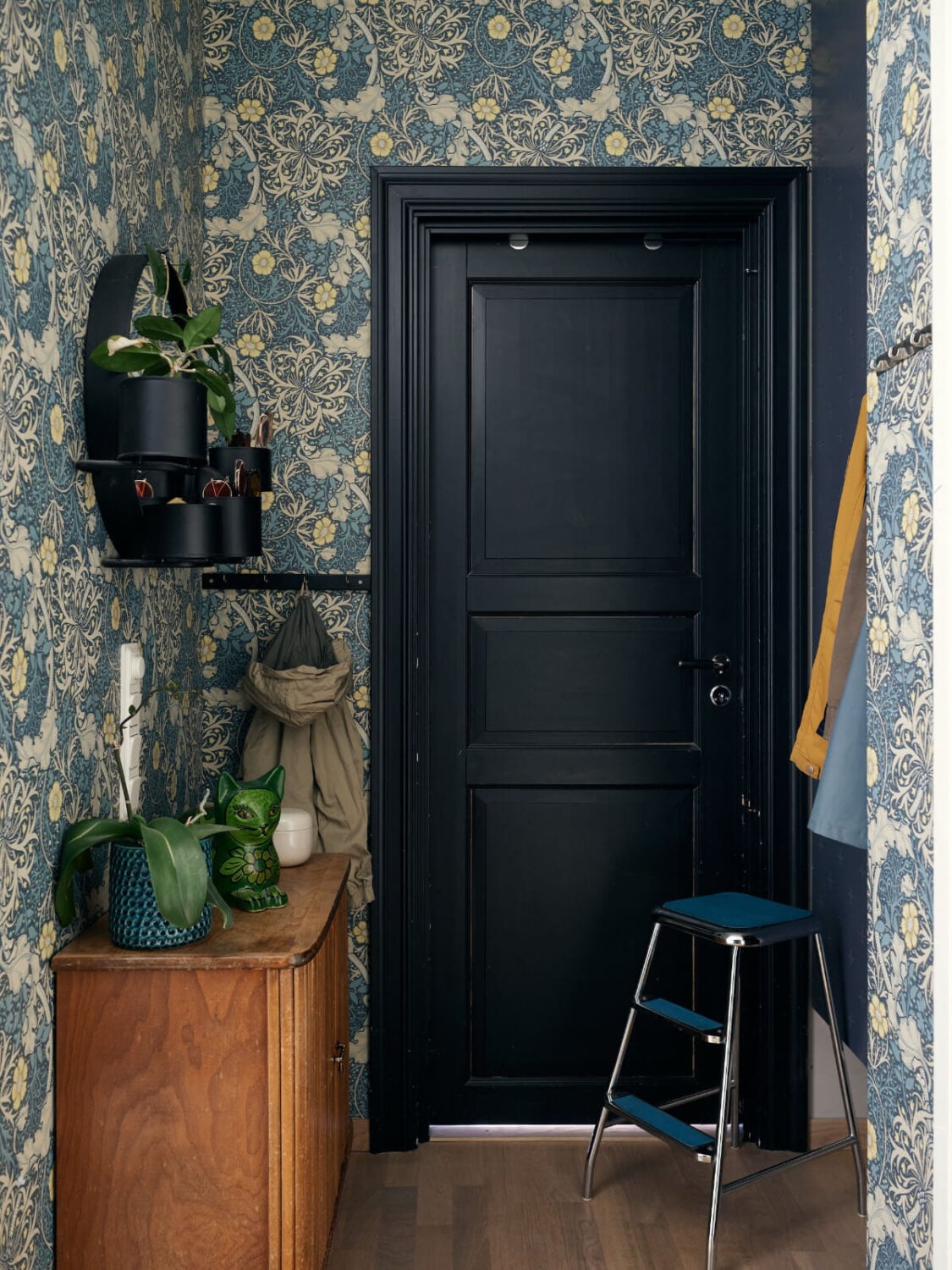 A Stunning Top-Floor Apartment with High Ceilings in a Former Church 30 hall blue wallpaper A Stunning Top-Floor Apartment with High Ceilings in a Former Church