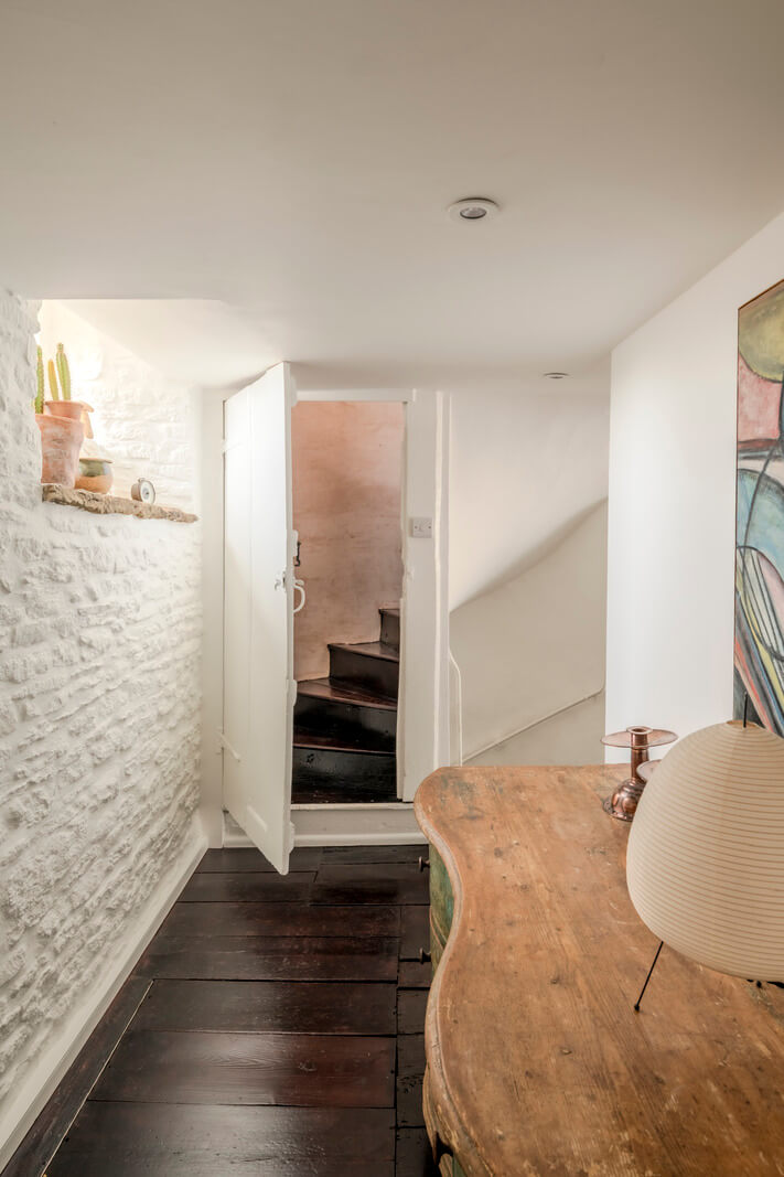 White-Washed Walls and Rustic Elements in a 17th Century Townhouse 28 hall brick wall