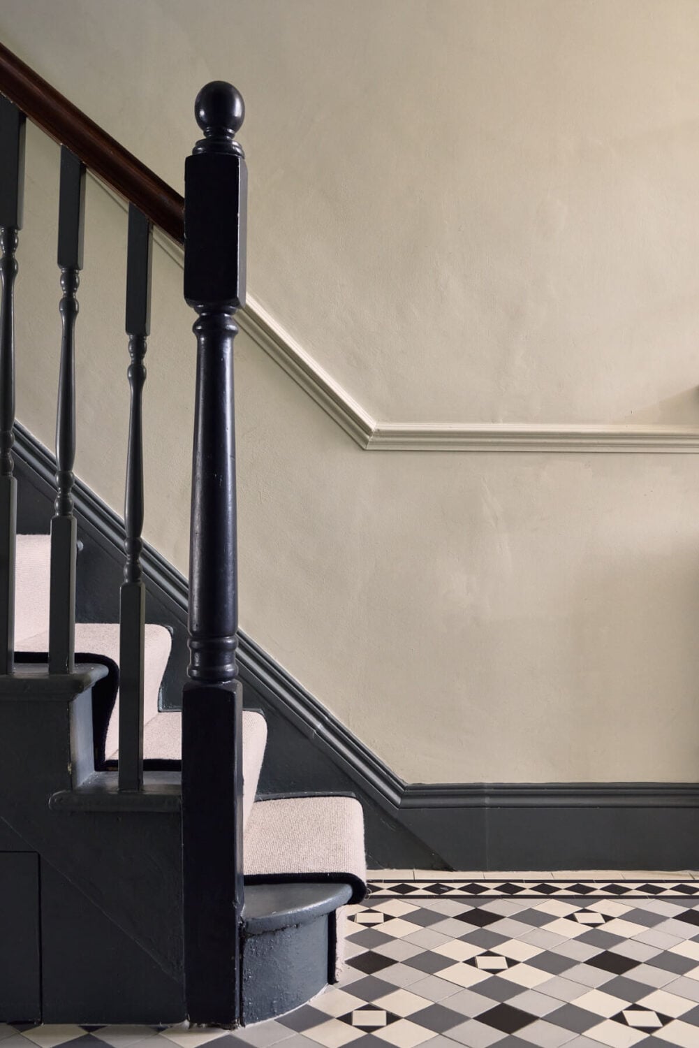 Moody Tones in a Restored and Extended Victorian Home in London 14 hall floor tiles wooden staircase