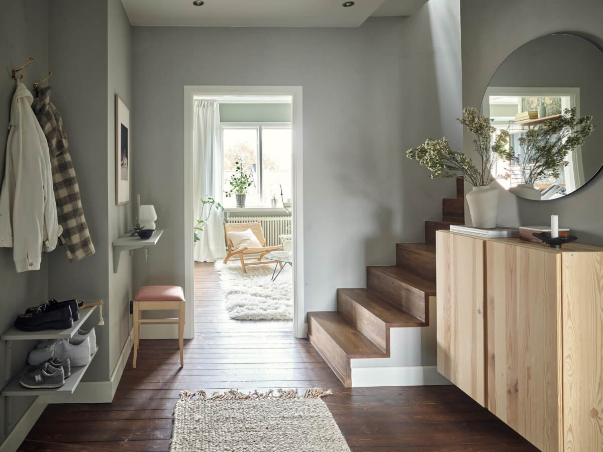 A Harmonious Color Palette in a Swedish Duplex Apartment 20 hall ikea ivar cabinets