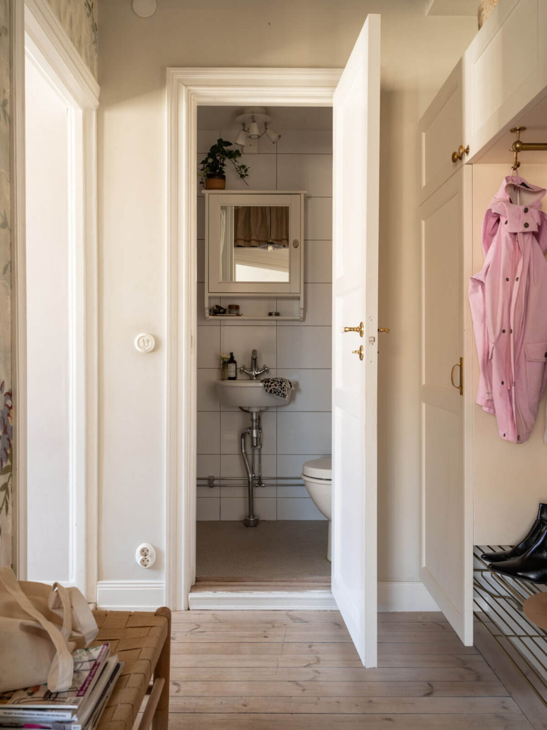 A Small Light-Filled Corner Apartment with Original Details 20 hall view into bathroom A Small Light-Filled Corner Apartment with Original Details