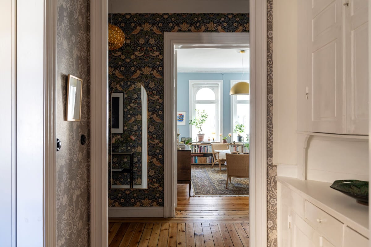 Wallpapers and Blue Tones in a Cozy Turn-of-the-Century Home 23 hall with green wallpaper