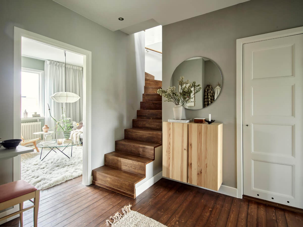 A Harmonious Color Palette in a Swedish Duplex Apartment 21 hall with staircase