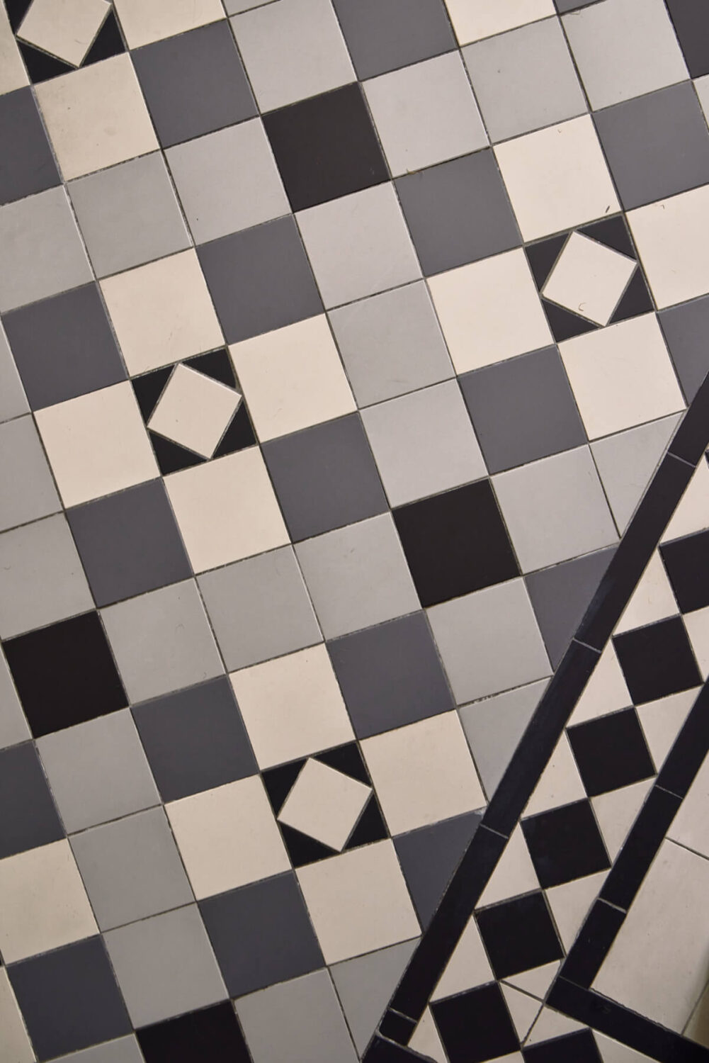 Moody Tones in a Restored and Extended Victorian Home in London 15 hallway tiles