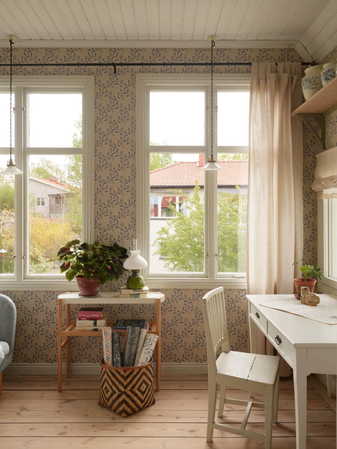 Light-Filled Rooms and Wallpapers in a Swedish Country House 17 home office blue wallpaper wooden floor