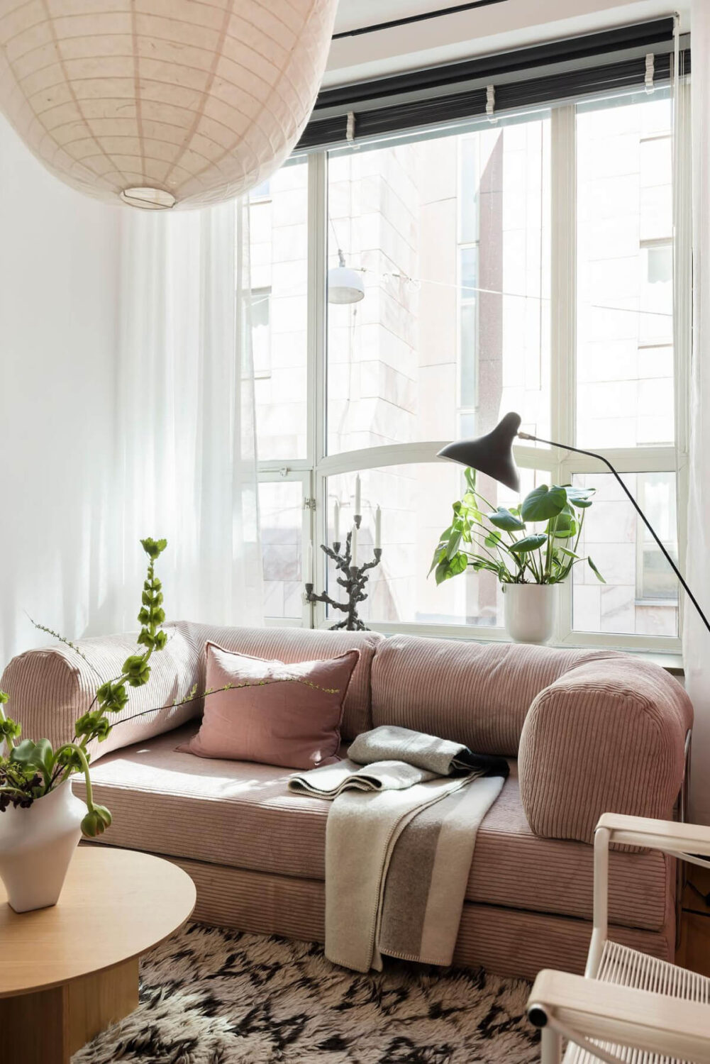 A Teal Green Living Room and Large Windows in a Swedish Apartment 22 home office sofa detail
