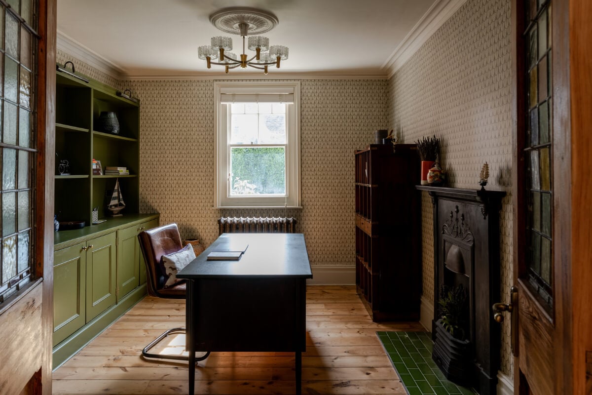 A Grand Edwardian Villa with a Yellow Kitchen and Coastal Views 17 home office wallpaper green bookcases