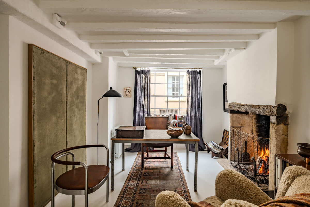 White-Washed Walls and Rustic Elements in a 17th Century Townhouse 4 home office white painted wooden beams fireplace