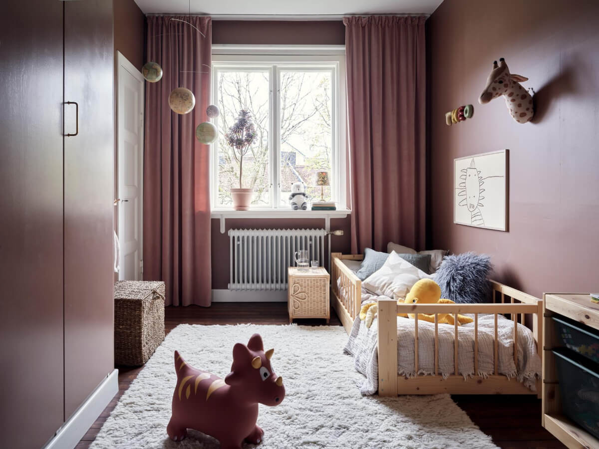 A Harmonious Color Palette in a Swedish Duplex Apartment 16 kids bedroom aubergine walls wardorbes