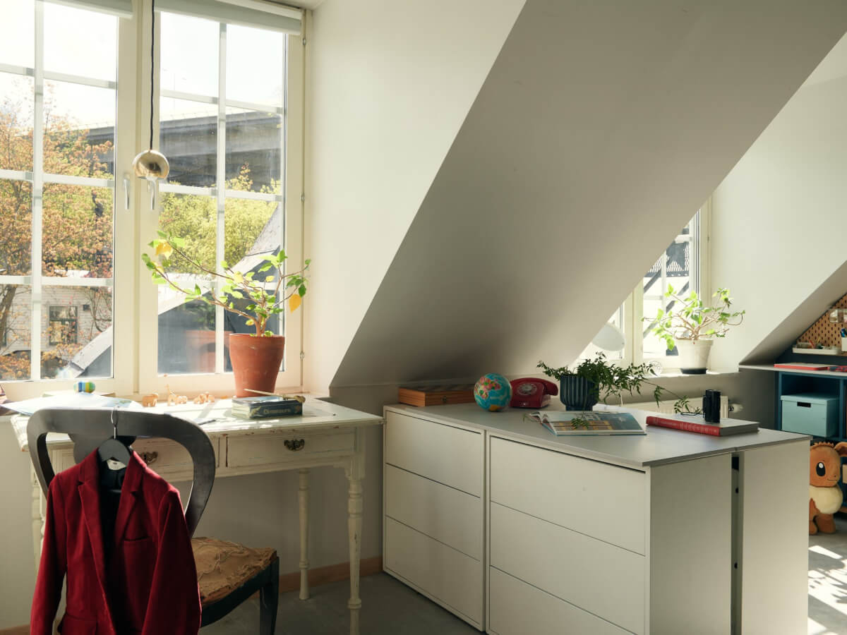 A Stunning Top-Floor Apartment with High Ceilings in a Former Church 22 kids bedroom vintage desk under window